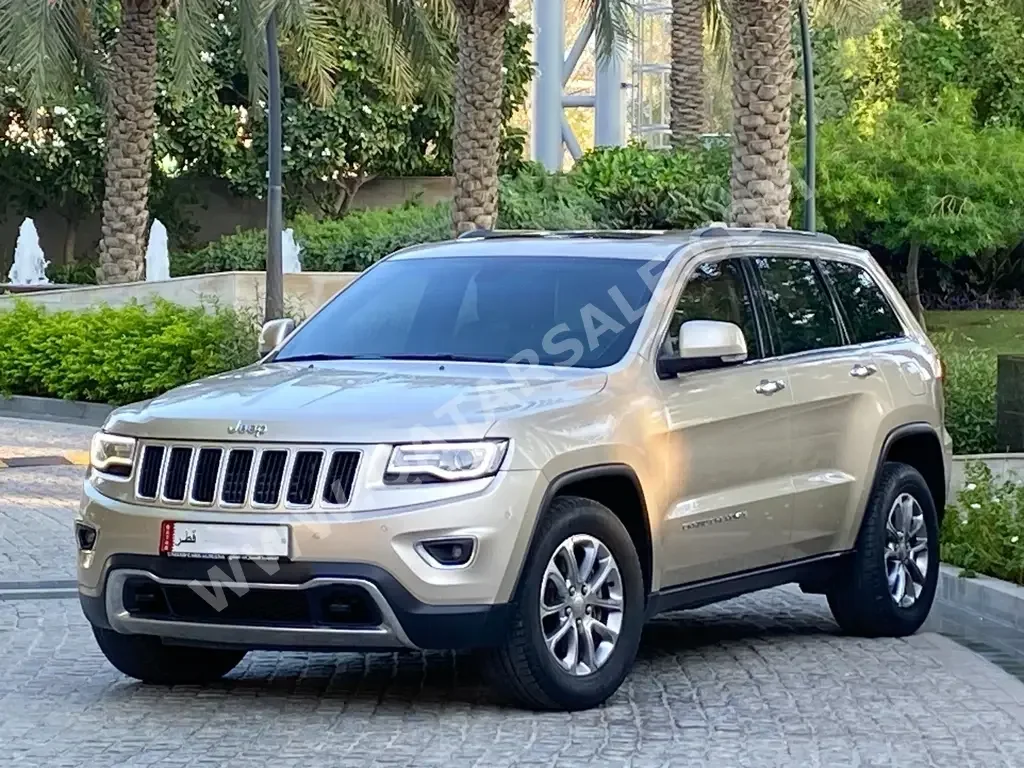 Jeep  Grand Cherokee  Limited  2014  Automatic  91,000 Km  6 Cylinder  Four Wheel Drive (4WD)  SUV  Gold