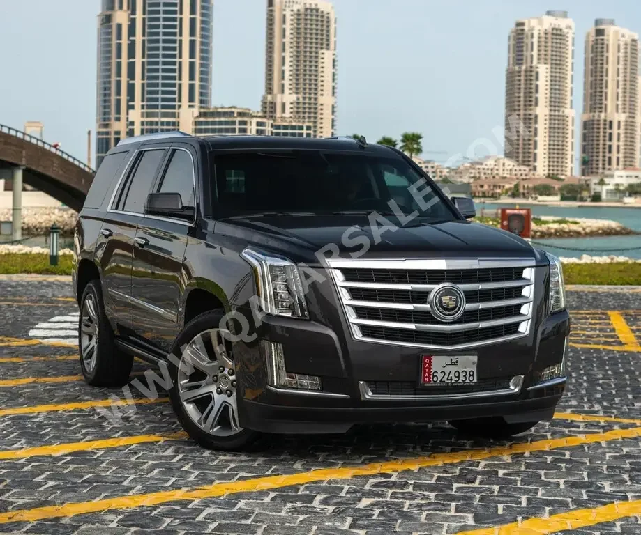 Cadillac  Escalade  Platinum  2015  Automatic  68,000 Km  8 Cylinder  All Wheel Drive (AWD)  SUV  Gray  With Warranty