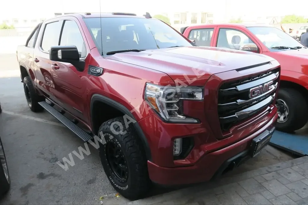 GMC  Sierra  Elevation  2019  Automatic  31,000 Km  8 Cylinder  Four Wheel Drive (4WD)  Pick Up  Red