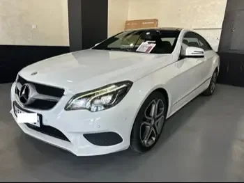 Mercedes-Benz  E-Class  200  2016  Automatic  106,000 Km  4 Cylinder  Rear Wheel Drive (RWD)  Coupe / Sport  White