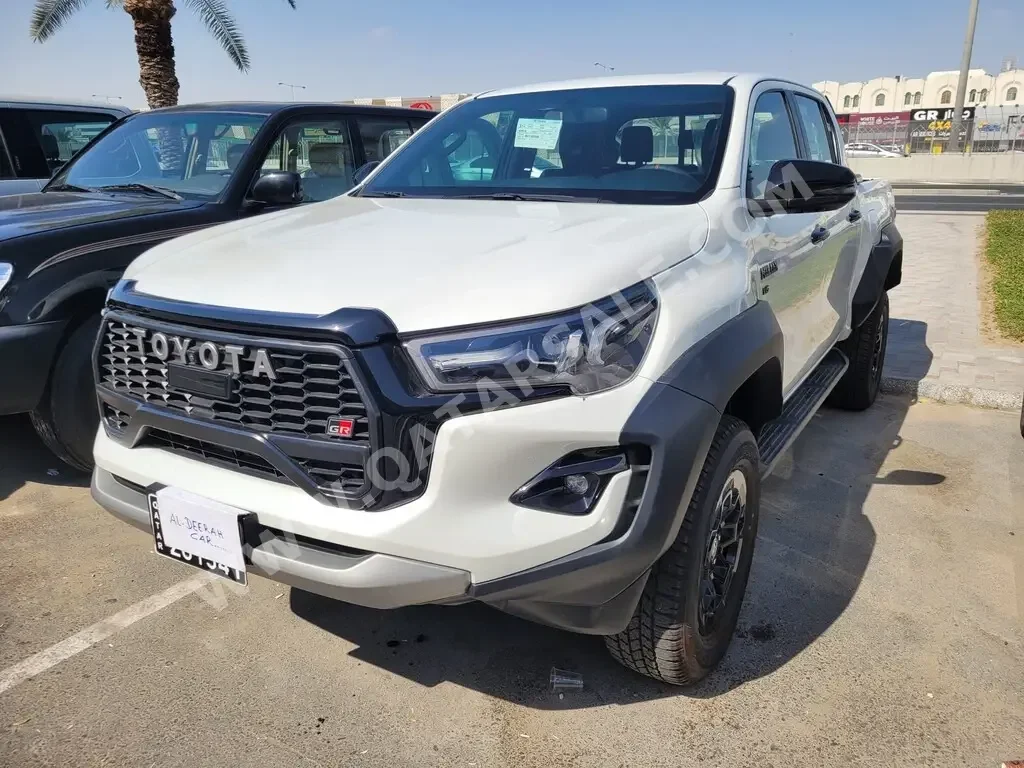 Toyota  Hilux  GR Sport  2024  Automatic  1,200 Km  6 Cylinder  Four Wheel Drive (4WD)  Pick Up  White  With Warranty