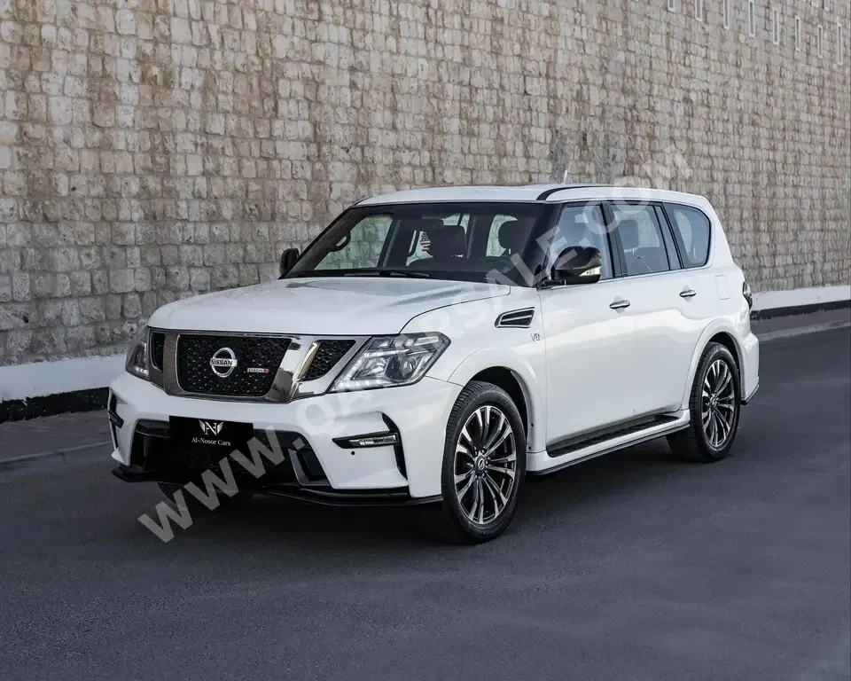 Nissan  Patrol  SE  2012  Automatic  185,000 Km  8 Cylinder  Four Wheel Drive (4WD)  SUV  White
