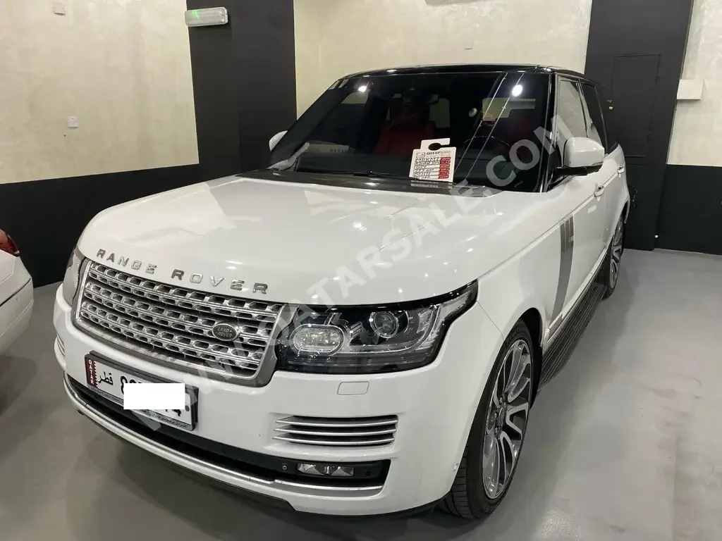 Land Rover  Range Rover  Vogue SE Super charged  2014  Automatic  239,000 Km  8 Cylinder  Four Wheel Drive (4WD)  SUV  White