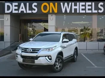 Toyota  Fortuner  SR5  2019  Automatic  69,500 Km  6 Cylinder  Four Wheel Drive (4WD)  SUV  White  With Warranty