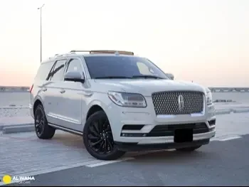 Lincoln  Navigator  2021  Automatic  35,000 Km  6 Cylinder  Four Wheel Drive (4WD)  SUV  Pearl  With Warranty