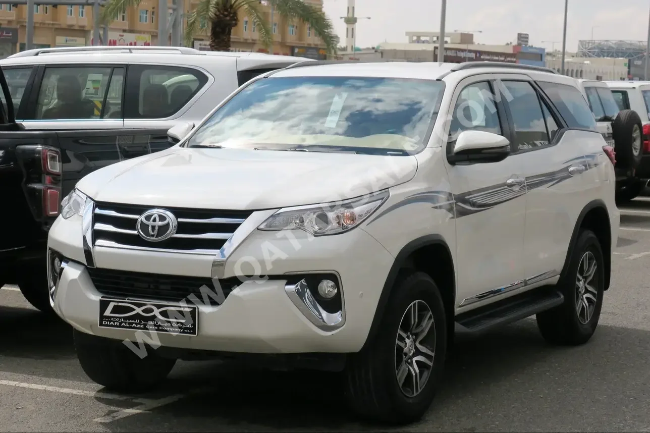 Toyota  Fortuner  2019  Automatic  72,000 Km  6 Cylinder  Four Wheel Drive (4WD)  SUV  White