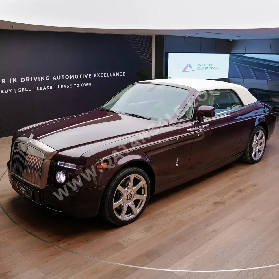 Rolls-Royce  Phantom  Drophead  2011  Automatic  44,000 Km  12 Cylinder  All Wheel Drive (AWD)  Convertible  Purple
