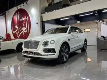  Bentley  Bentayga  2018  Automatic  87,000 Km  12 Cylinder  Four Wheel Drive (4WD)  SUV  White  With Warranty