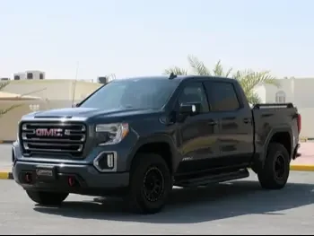  GMC  Sierra  AT4  2019  Automatic  110,000 Km  8 Cylinder  Four Wheel Drive (4WD)  Pick Up  Dark Gray  With Warranty