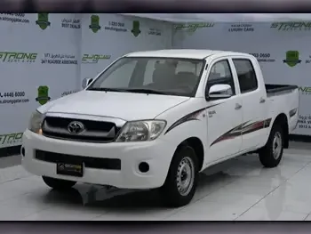 Toyota  Hilux  2009  Manual  130,000 Km  4 Cylinder  Four Wheel Drive (4WD)  Pick Up  White