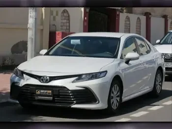 Toyota  Camry  LE  2023  Automatic  21,400 Km  4 Cylinder  Front Wheel Drive (FWD)  Sedan  White  With Warranty
