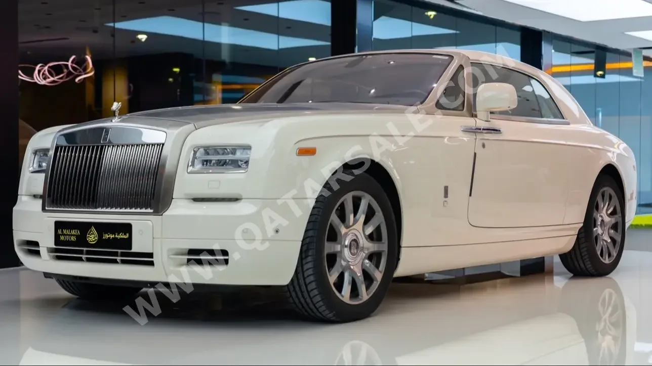 Rolls-Royce  Phantom  2013  Automatic  23,000 Km  12 Cylinder  Rear Wheel Drive (RWD)  Sedan  White