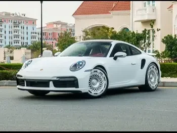 Porsche  911  Turbo  2022  Automatic  14,000 Km  6 Cylinder  Rear Wheel Drive (RWD)  Coupe / Sport  White  With Warranty