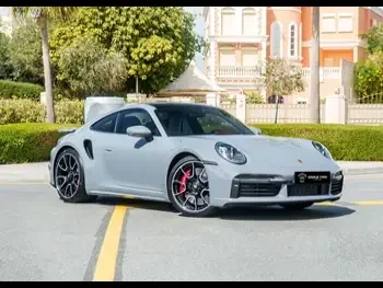 Porsche  911  Turbo  2024  Automatic  300 Km  6 Cylinder  Rear Wheel Drive (RWD)  Coupe / Sport  Gray  With Warranty