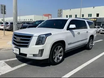 Cadillac  Escalade  2016  Automatic  137,000 Km  8 Cylinder  Four Wheel Drive (4WD)  SUV  White