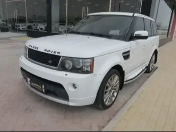 Land Rover  Range Rover  Sport HSE  2013  Automatic  127,000 Km  8 Cylinder  Four Wheel Drive (4WD)  SUV  White