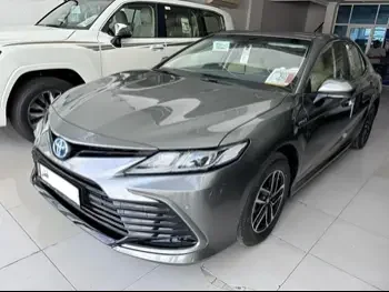 Toyota  Camry  Hybrid  2024  Automatic  0 Km  4 Cylinder  Front Wheel Drive (FWD)  Sedan  Gray  With Warranty
