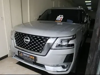 Nissan  Patrol  LE  2021  Automatic  74,000 Km  8 Cylinder  Four Wheel Drive (4WD)  SUV  White  With Warranty