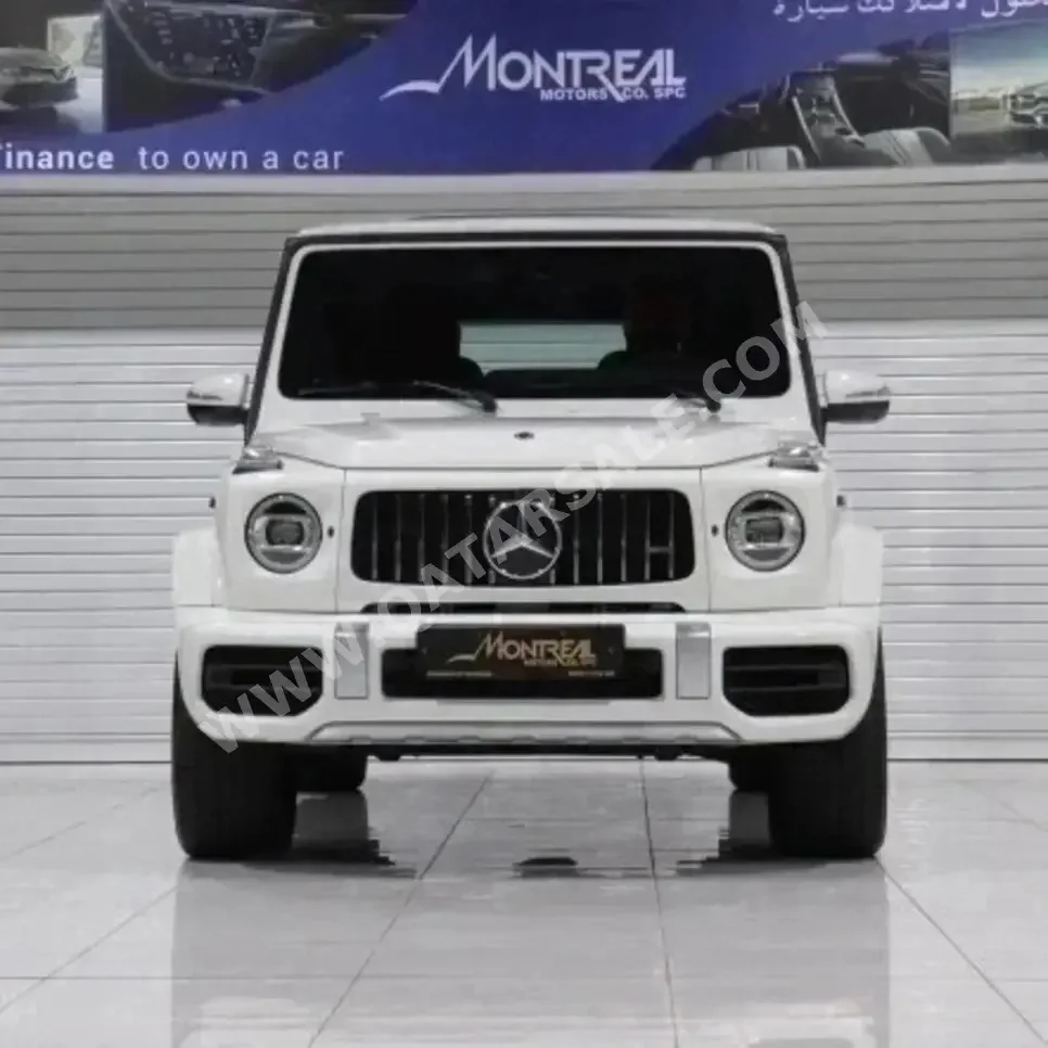 Mercedes-Benz  G-Class  63 AMG  2021  Automatic  25,000 Km  8 Cylinder  Four Wheel Drive (4WD)  SUV  White  With Warranty