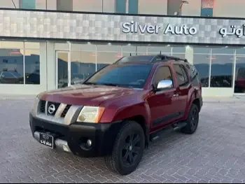 Nissan  Xterra  SE  2008  Automatic  230,000 Km  6 Cylinder  Four Wheel Drive (4WD)  SUV  Red