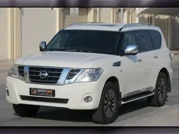 Nissan  Patrol  Platinum  2015  Automatic  214,000 Km  8 Cylinder  Four Wheel Drive (4WD)  SUV  White