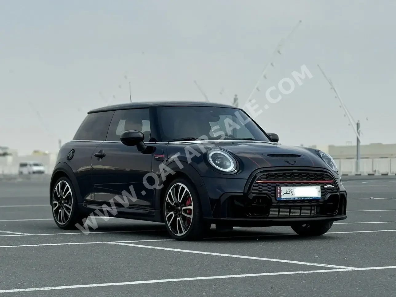 Mini  Cooper  JCW  2023  Automatic  73,000 Km  4 Cylinder  Front Wheel Drive (FWD)  Hatchback  Black  With Warranty