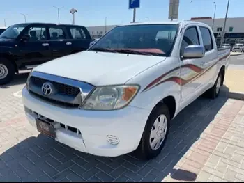 Toyota  Hilux  2006  Manual  268,000 Km  4 Cylinder  Four Wheel Drive (4WD)  Pick Up  White