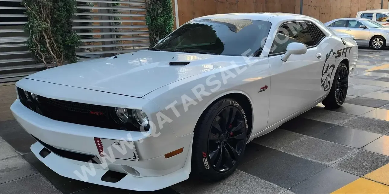 Dodge  Challenger  SRT-8  2014  Automatic  139,000 Km  8 Cylinder  Rear Wheel Drive (RWD)  Coupe / Sport  White