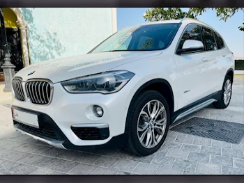 BMW  X-Series  X1  2018  Automatic  76,000 Km  4 Cylinder  Four Wheel Drive (4WD)  SUV  White  With Warranty
