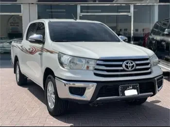 Toyota  Hilux  SR5  2016  Manual  61,000 Km  4 Cylinder  Four Wheel Drive (4WD)  Pick Up  White