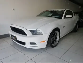 Ford  Mustang  2013  Manual  28,000 Km  8 Cylinder  Rear Wheel Drive (RWD)  Coupe / Sport  White