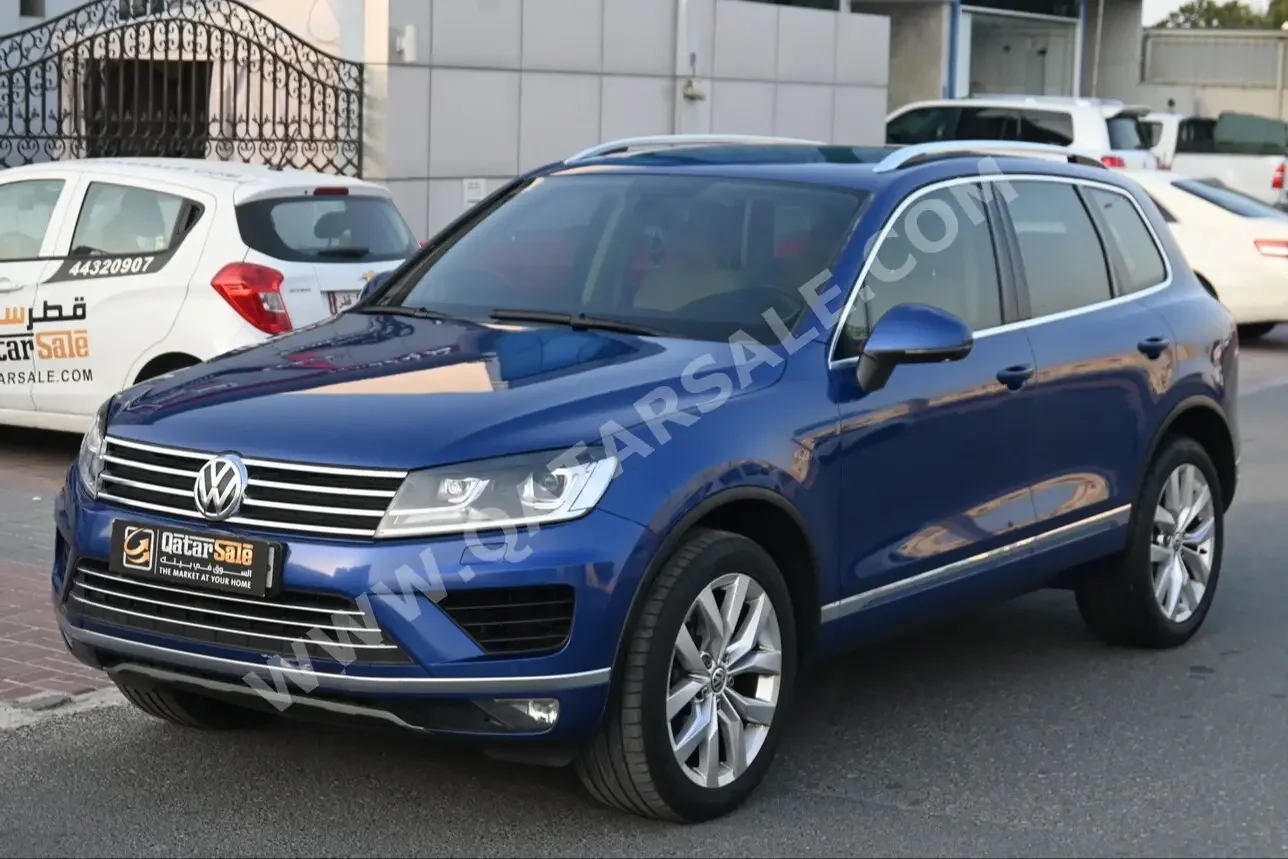 Volkswagen  Touareg  Sport  2015  Automatic  75,000 Km  6 Cylinder  Four Wheel Drive (4WD)  SUV  Blue