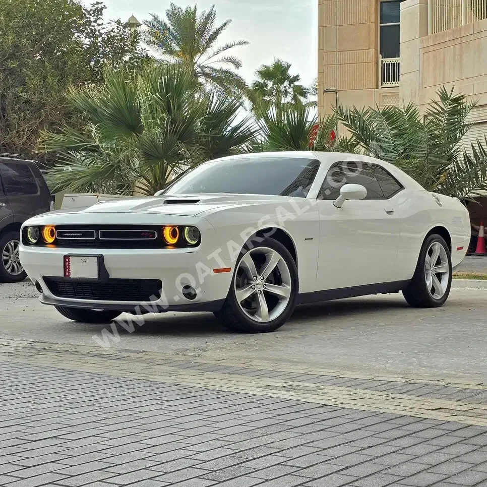 Dodge  Challenger  R/T  2016  Automatic  61,000 Km  8 Cylinder  Rear Wheel Drive (RWD)  Coupe / Sport  White  With Warranty