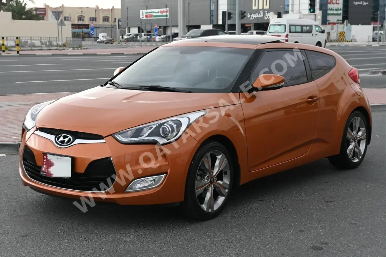  Hyundai  Veloster  2017  Automatic  105,000 Km  4 Cylinder  Front Wheel Drive (FWD)  Hatchback  Orange  With Warranty