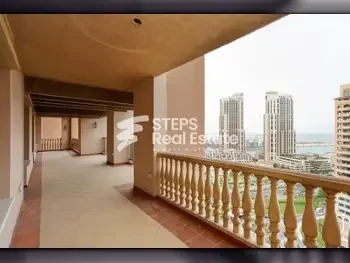 4 Bedrooms  Apartment  For Rent  Doha -  The Pearl  Semi Furnished