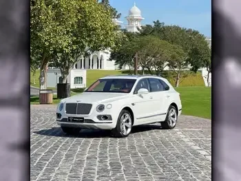 Bentley  Bentayga  2017  Automatic  38,000 Km  12 Cylinder  Four Wheel Drive (4WD)  SUV  White