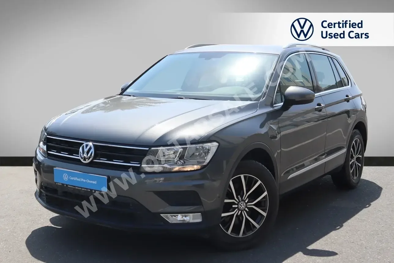 Volkswagen  Tiguan  1.4 TSI  2017  Automatic  15,700 Km  4 Cylinder  Front Wheel Drive (FWD)  SUV  Gray