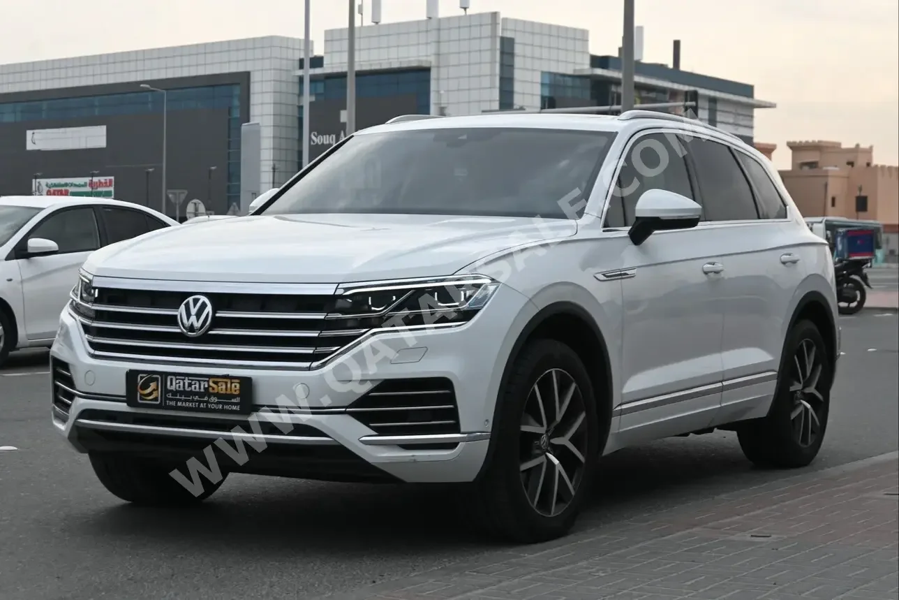 Volkswagen  Touareg  Highline plus  2019  Automatic  68,700 Km  6 Cylinder  Four Wheel Drive (4WD)  SUV  White  With Warranty