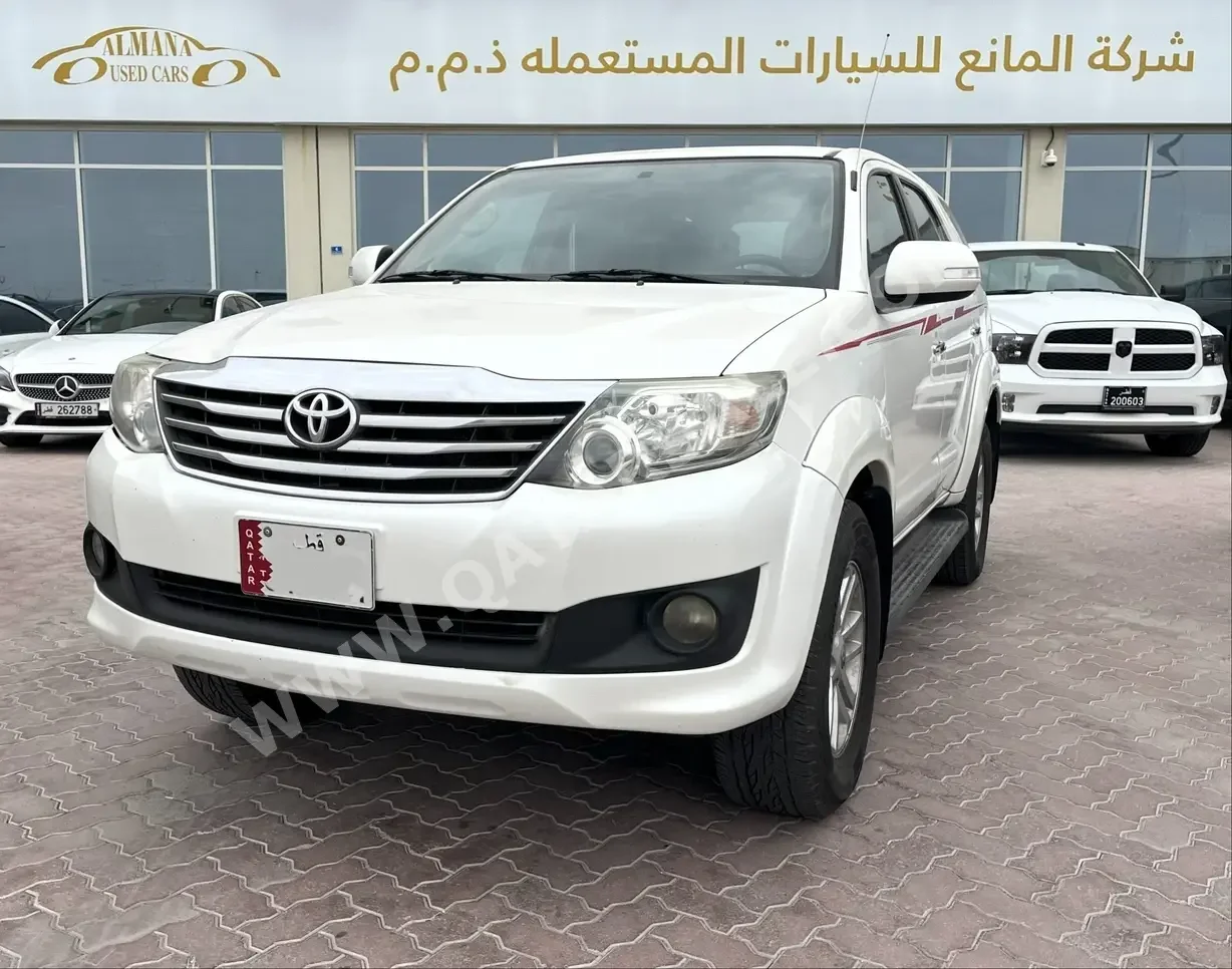 Toyota  Fortuner  SR5  2014  Automatic  280,000 Km  4 Cylinder  Four Wheel Drive (4WD)  SUV  White