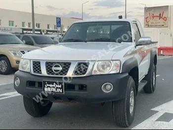  Nissan  Patrol  Pickup  2013  Manual  245,000 Km  6 Cylinder  Four Wheel Drive (4WD)  Pick Up  White  With Warranty
