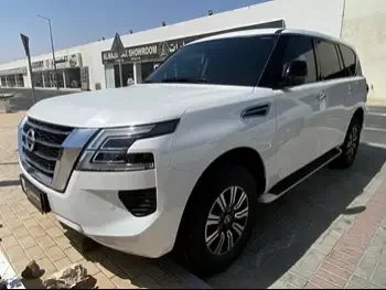 Nissan  Patrol  XE  2020  Automatic  58,000 Km  6 Cylinder  Four Wheel Drive (4WD)  SUV  White  With Warranty
