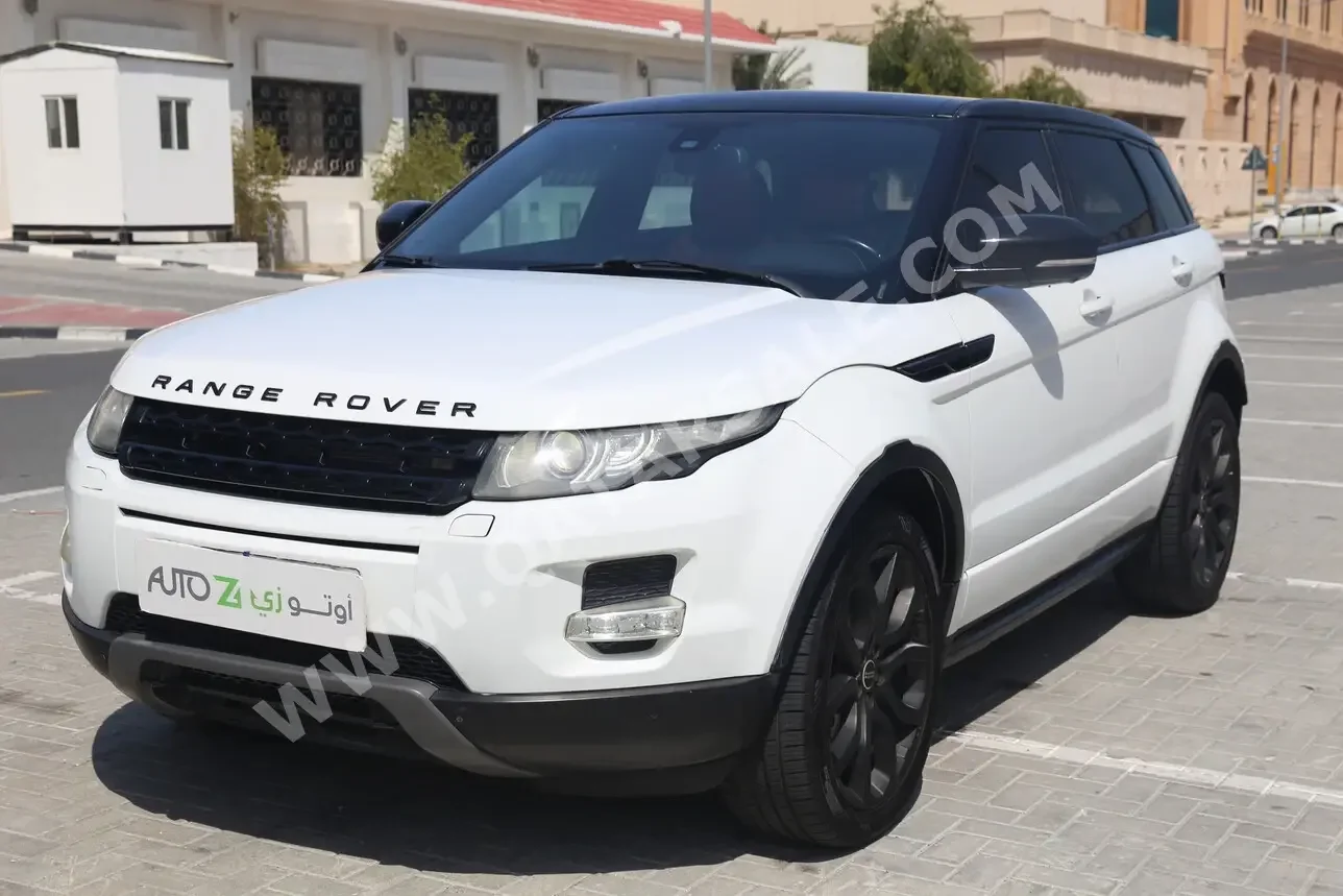 Land Rover  Evoque  2012  Automatic  91,000 Km  4 Cylinder  Four Wheel Drive (4WD)  SUV  White