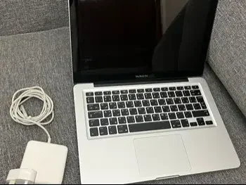 Laptops Apple  - MacBook Pro 13 Inch  - Silver  - MacOS  - Intel  - Core i5  -Memory (Ram): 4 GB