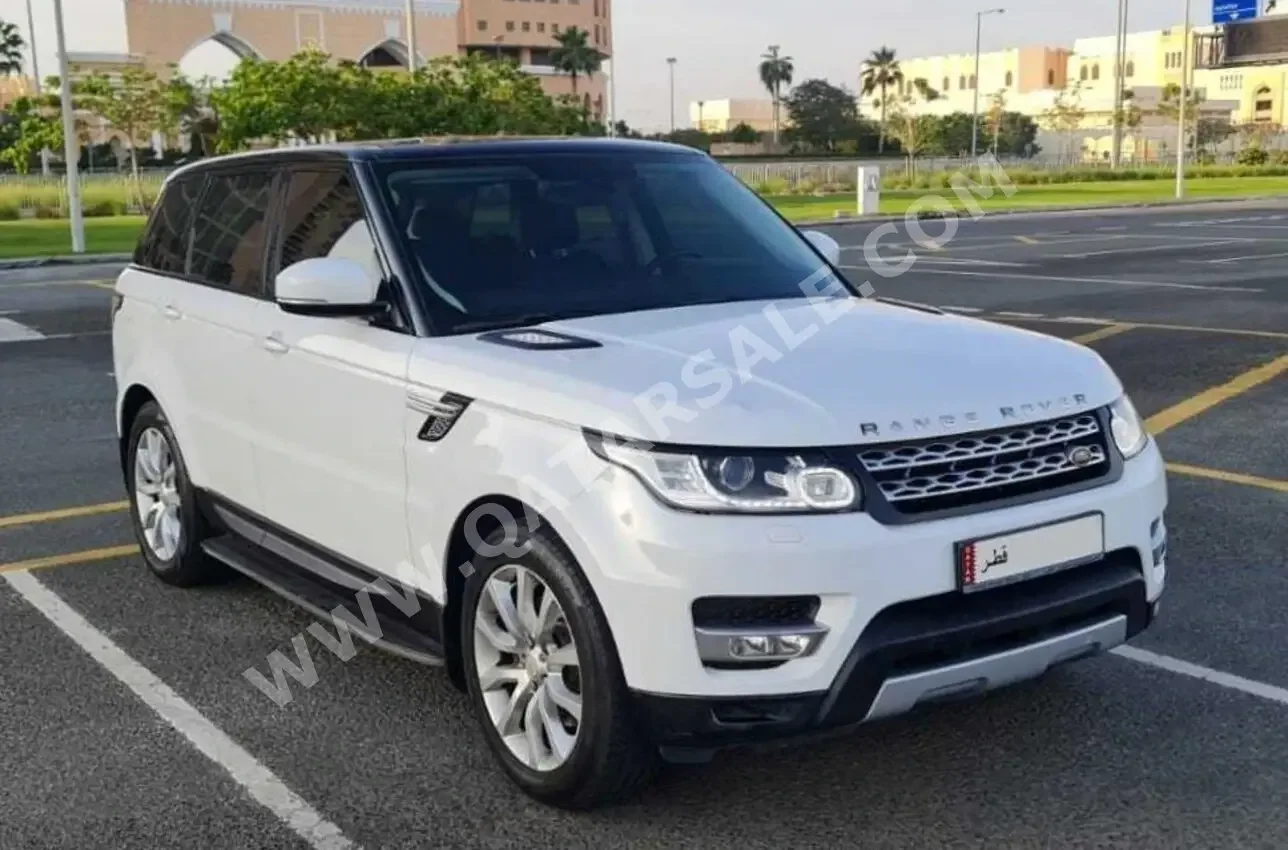 Land Rover  Range Rover  Sport HST  2014  Automatic  120,000 Km  6 Cylinder  Four Wheel Drive (4WD)  SUV  White
