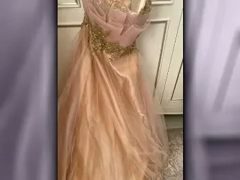 فستان  زهري المقاس: 42
