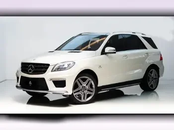 Mercedes-Benz  ML  63 AMG  2014  Automatic  74,000 Km  8 Cylinder  Four Wheel Drive (4WD)  SUV  White