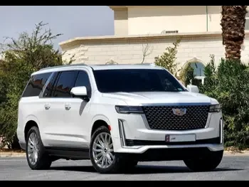  Cadillac  Escalade  Premium  2023  Automatic  40,000 Km  8 Cylinder  Four Wheel Drive (4WD)  SUV  White  With Warranty