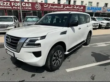 Nissan  Patrol  XE  2021  Automatic  73,000 Km  6 Cylinder  Four Wheel Drive (4WD)  SUV  White