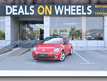 Volkswagen  Beetle  2015  Tiptronic  74,900 Km  4 Cylinder  Front Wheel Drive (FWD)  Hatchback  Red