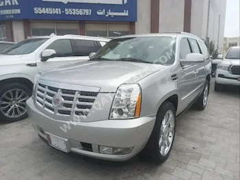 Cadillac  Escalade  2010  Automatic  37,000 Km  8 Cylinder  Four Wheel Drive (4WD)  SUV  Silver  With Warranty